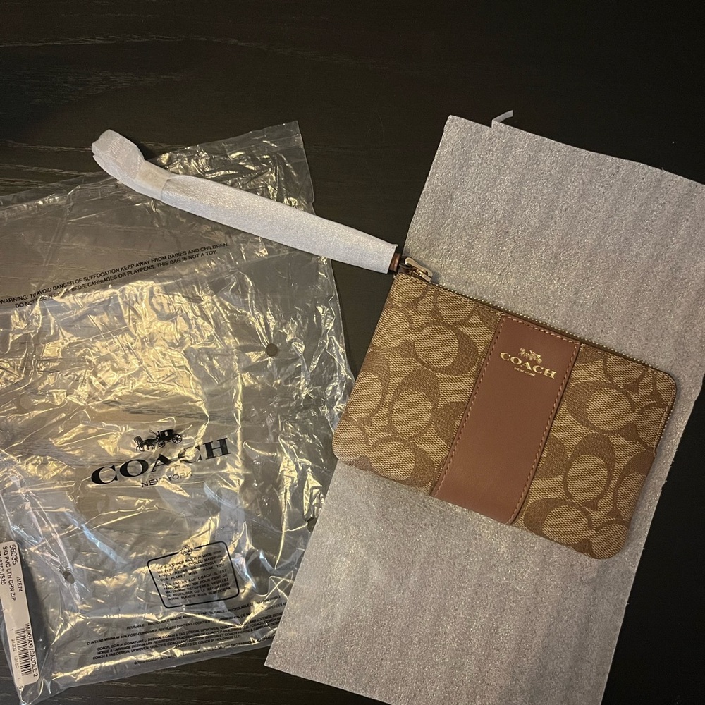 Brand new Coach wristlet